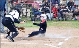  ??  ?? Freshman Lady Blackhawk Blakelee Winn (No. 6) slides safely into home Monday evening in the game against West Fork for the last home game of the season. Winn had three hits, three runs in the defeat over the Lady Tigers.