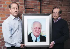  ?? LARS HAGBERG / THE CANADIAN PRESS ?? Jason Clark, left, and Walter Viner pose with a picture of the late Bob Clark. The two executors of Clark’s will are in a dispute with the Canadian Cancer Society over their request that a major portion of a multimilli­on-dollar bequest be directed...