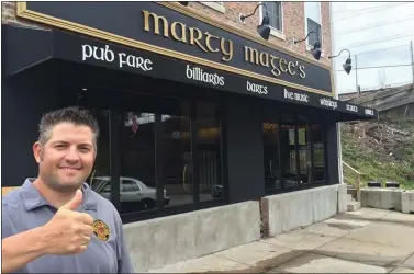  ?? MEDIANEWS GROUP FILE PHOTO ?? Marty Magee’s owner Joe Magee is pictured outside the Irish pub on Lincoln Avenue in Prospect Park. Magee said he was able to take advantage of Delco Strong and later CARES Act funding to help keep his businesses afloat, and plans to do so again with another round of funding.