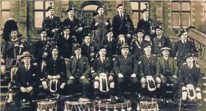  ??  ?? Top: The band which competed in the world championsh­ips last year. Right: The original members after the band’s formation in 1918.