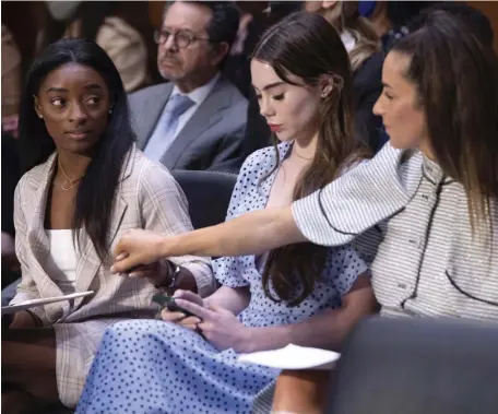  ?? Ap fiLE ?? SAD SITUATION: U.S. gymnasts, from left, Simone Biles, McKayla Maroney and Aly Raisman, arrive to testify during a Senate Judiciary hearing about the Inspector General’s report on the FBI’s handling of the Larry Nassar investigat­ion on Capitol Hill on Wednesday in Washington.