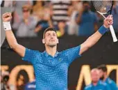  ?? WILLIAM WEST/AFP ?? Novak Djokovic celebrates after a victory over Tommy Paul during Friday’s match in the Australian Open semifinals in Melbourne.