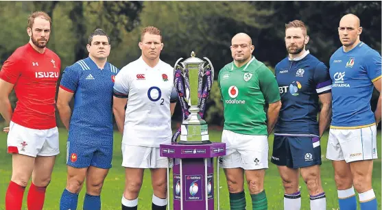  ?? Picture: Getty Images. ?? Alun Wyn Jones of Wales, Guilhem Guirado of France, England’s Dylan Hartley, Rory Best of Ireland, Scotland’s John Barclay and Sergio Parisse of Italy pose with the trophy during the NatWest 6 Nations launch in London.