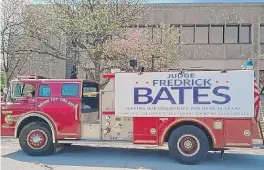  ?? | FACEBOOK. ?? The decommissi­oned firetruck with the Bates campaign sign in front of the Markham courthouse steps last week.