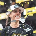  ?? LILY SMITH/USA TODAY NETWORK ?? Caitlin Clark, shown after Iowa won the Big Ten Tournament, is the sport’s most recognizab­le player, according to a poll.