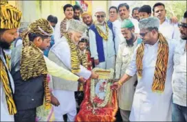  ?? PTI ?? Members of the Tipu Sultan United Forum participat­e in an event to mark the birth anniversar­y of the former ruler of Mysore in Bengaluru on Friday.