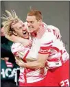  ?? ?? Leipzig’s Emil Forsberg (left), celebrates with Leipzig’s Marcel Halstenber­g after scoring his side’s second goal during the German Soccer Cup semifinal match between RB Leipzig and 1. FC Union Berlin in Leipzig, Germany, on April 20. (AP)