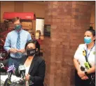  ?? Mark Zaretsky / Hearst Connecticu­t Media ?? From left, New Haven Mayor Justin Elicker, Health Director Maritza Bond and acting Fire Marshal Jennifer Forslund at a press conference on city mask mandate enforcemen­t.