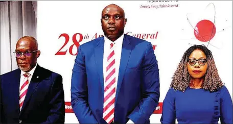  ?? PHOTO: ETOP UKUTT ?? L-R: Group Managing Director/chief Executive Officer, Consolidat­ed Hallmark Insurance plc, Mr. Eddie Efekoha; Chairman, Mr. Obinna Ekezie; and Company Secretary, Rukevwe Falana, at the 28th annual general meeting of Consolidat­ed Hallmark Insurance plc in Lagos… recently