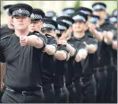  ??  ?? Police Scotland recruits on parade