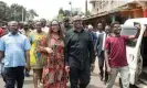  ?? Photograph: Patrick Meinhardt/AFP/Getty Images ?? Peter Obi (centre) after casting his ballot at the weekend.