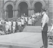  ?? TIM LUCAS/TORONTO STAR FILE PHOTO ?? A crowd of more than 600 people lined up down the city hall steps for free vaccines in Toronto in 1959.