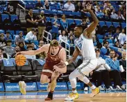  ?? Jayne Kamin-Oncea/Associated Press ?? Stanford guard Michael Jones, left, and the Cardinal improved to 2-1 in Pac-12 play with a win over UCLA.