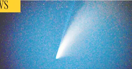  ?? DAVID BECKER/AFP VIA GETTY IMAGES ?? The five-kilometre-wide comet Neowise is seen in the Nevada sky on Saturday. It will make its closest pass to Earth on Wednesday.