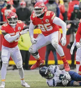  ?? Rich Sugg/TNS ?? Kansas City Chiefs defensive tackle Chris Jones (95) celebrates after bringing down Seattle Seahawks running back Kenneth Walker during a game at GEHA Field at Arrowhead Stadium on Dec. 24 in Kansas City, Mo.