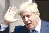  ?? REUTERS ?? British Prime Minister Boris Johnson waves to his supporters at Downing Street in London on Wednesday.