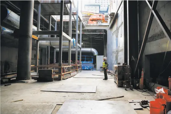  ?? Michael Macor / The Chronicle ?? Central Subway project manager John Funghi looks up from under Union Square, where work continues on the line from Fourth and King streets to Chinatown.