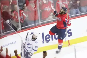  ?? GETTY IMAGES ?? The Capitals’ Devante Smith- Pelly celebrates his goal in the third period against the Lightning.