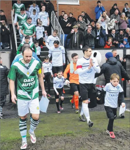  ?? Pictures: Tom Gregory, Salisbury Journal ?? Ashford led out by captain Michael Phillips at Salisbury’s Raymond McEnhill Stadium on Saturday