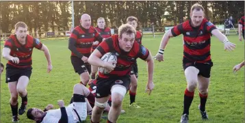  ??  ?? Arklow’s Jack Joyce heading for the try line.