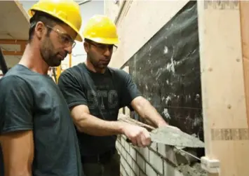  ?? JULIEN GIGNAC/TORONTO STAR ?? Once the intensive program ends, brothers Dabbah Dib, left, and Salah Dib will be connected with stable work.