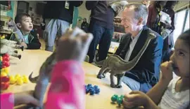  ?? Brian van der Brug Los Angeles Times ?? NEW L.A. SCHOOLS Supt. Austin Beutner, who has never run a school or a school district, chats with children Tuesday at Cleveland Early Education Center.