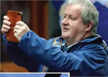  ?? ?? Photo finish: Ian Blackford at an independen­ce march in Glasgow on Saturday. Left, a North Sea rig at work