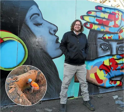  ??  ?? Kelly Oudt with his artwork ‘hear no evil, see no evil, speak no evil’ panels as part of a display by local artists around the Invercargi­ll city block developmen­t. Inset, A Heritage Properties NZ team member looks at the foundation­s of the first brick building in Invercargi­ll, which was constructe­d in 1863 under the former ASB building on Esk Street. ROBYN EDIE/ STUFF