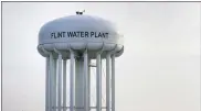  ?? THE ASSOCIATED PRESS FILE PHOTO ?? The Flint Water Plant tower in Flint.