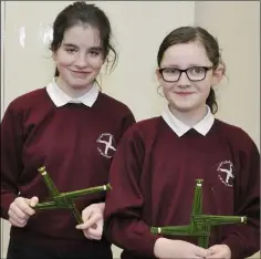  ??  ?? Lisa Marie Casey and Isabella Houssaye with their completed crosses.