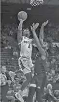  ?? CHRIS JONES/USA TODAY SPORTS ?? Baylor guard LJ Cryer (4) scores against Nicholls State during the first half at Ferrell Center.