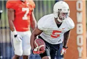  ?? [PHOTO BY CHRIS LANDSBERGE­R, THE OKLAHOMAN] ?? Graduate transfer cornerback Kemah Siverand went through drills with Oklahoma State as part of Tuesday’s practice.