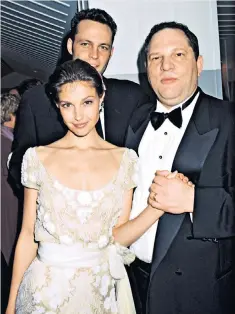  ??  ?? Harvey Weinstein, right, with actress Ashley Judd at an Oscars party in 1997