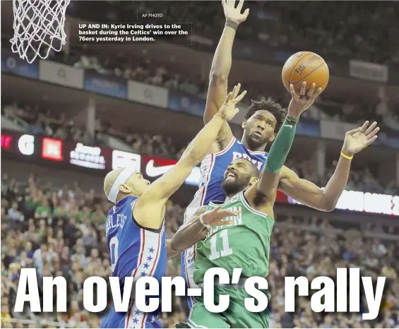  ?? AP PHOTO ?? UP AND IN: Kyrie Irving drives to the basket during the Celtics’ win over the 76ers yesterday in London.