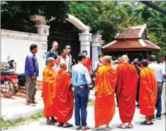  ?? SRENG MENG SRUN ?? Supporters assemble in front of the capital home of Kem Sokha on Monday after he was granted bail.