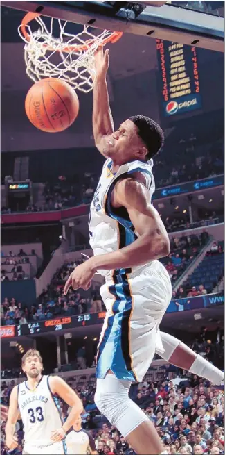  ?? Nikki Boertman/the Commercial Appeal ?? Grizzlies forward Rudy Gay slams home two of his 26 points on a breakaway dunk against the New York Knicks. “People don’t think we hear what people are talking about,” Gay said of criticism of the team.