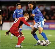  ?? Www.mphotograp­hic.co.uk ?? ●●Rico Richards in action during the game at Crawley Town