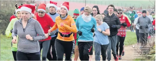  ??  ?? A range of Santa hats, Christmas jumpers, antlers and elves on the 2018 Ormskirk Christmas Day parkrun