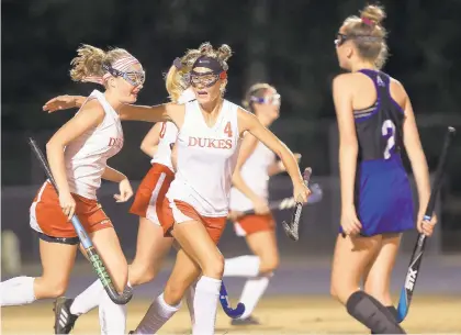  ?? ROB OSTERMAIER/STAFF PHOTOS ?? Gloucester's Tally Vaughan and Kate Neikirk celebrate a second-half goal against Atlee during their Class 5 state quarterfin­al Tuesday.