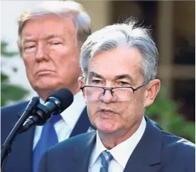  ?? — Reuters ?? Making their stand: Trump and Powell speaking to the media during a press conference at the White House in Washington.