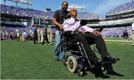  ??  ?? ▲ OJ Brigance appears on the field before the game between the Baltimore Ravens and the Carolina Panthers in 2014. Photograph: Larry French/Getty Images