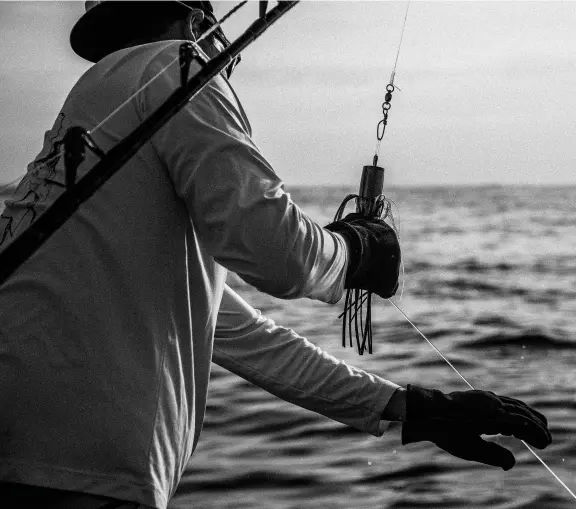  ??  ?? Mate and Tantrum Lures craftsman Nick Durham readies himself for another battle (above). Nasty
Habit’s Capt. Greg Hopkins (opposite) suggests sizing up the fish first, then wiring it accordingl­y.