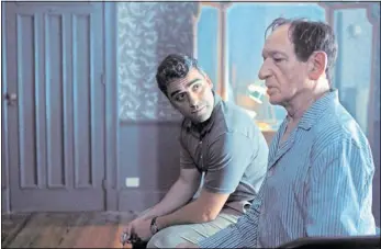  ?? courteSy Photo mGm ?? mossad agent Peter malkin (oscar isaac) speaks with adolf Eichmann (Ben kingsley).