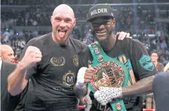  ?? REUTERS ?? Deontay Wilder, right, and Tyson Fury after Saturday’s fight in Los Angeles.