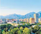  ?? ?? Peak perfection: Tirana is set against a backdrop of mountains