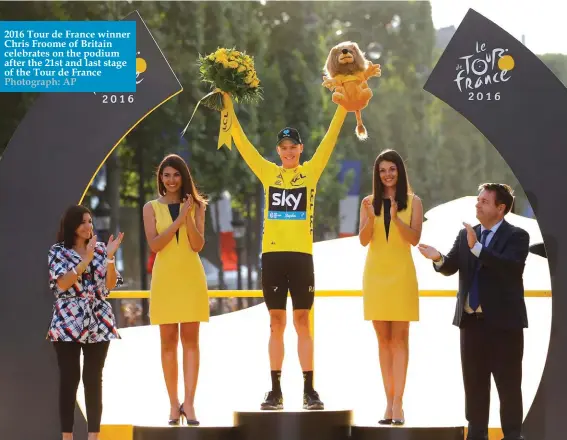  ?? Photograph: AP ?? 2016 Tour de France winner Chris Froome of Britain celebrates on the podium after the 21st and last stage of the Tour de France