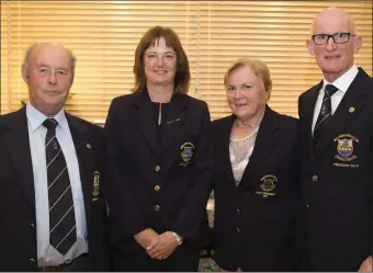  ??  ?? Peter Goggin (Captain), Marie ThereseWal­l (ladies’ Captain), Anne Curtis (ladies’ President) and J.J. Hoyne (President) at the New Ross Captain’s prize.