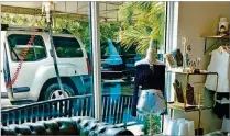  ?? JULIO POLETTI / THE PALM BEACH POST ?? At Rubber Ducky car wash, the once boring lobby has turned into a stylish boutique with ever-changing products and fashion items. There are open locations in Boca Raton and West Palm Beach, and one coming soon to Jupiter.