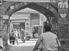  ??  ?? Residents on a street in Kasur. The rape and murders of a dozen children by a suspected serial killer have terrified parents in central Pakistan.