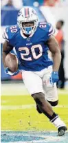  ?? MARK ZALESKI/AP ?? Bills running back Frank Gore carries the ball against the Tennessee Titans on Oct. 6.